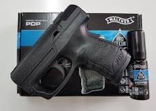 Spray lacrimogen model pistol